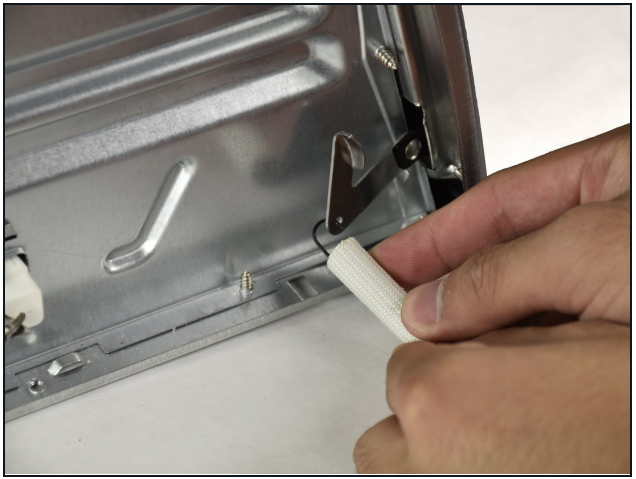 Black &-Decker-TO1303SB-Door-Spring-Removal-FIG 7