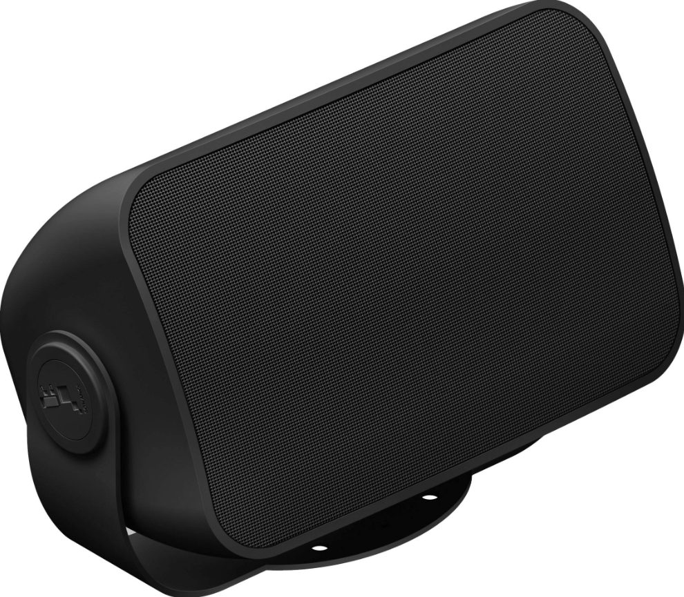 Outdoor speaker installed on patio wall for garden audio